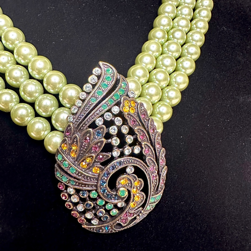 Heidi Daus Teardrop Pistachio 3 Strand Pearl necklace covered with Rhinestones.